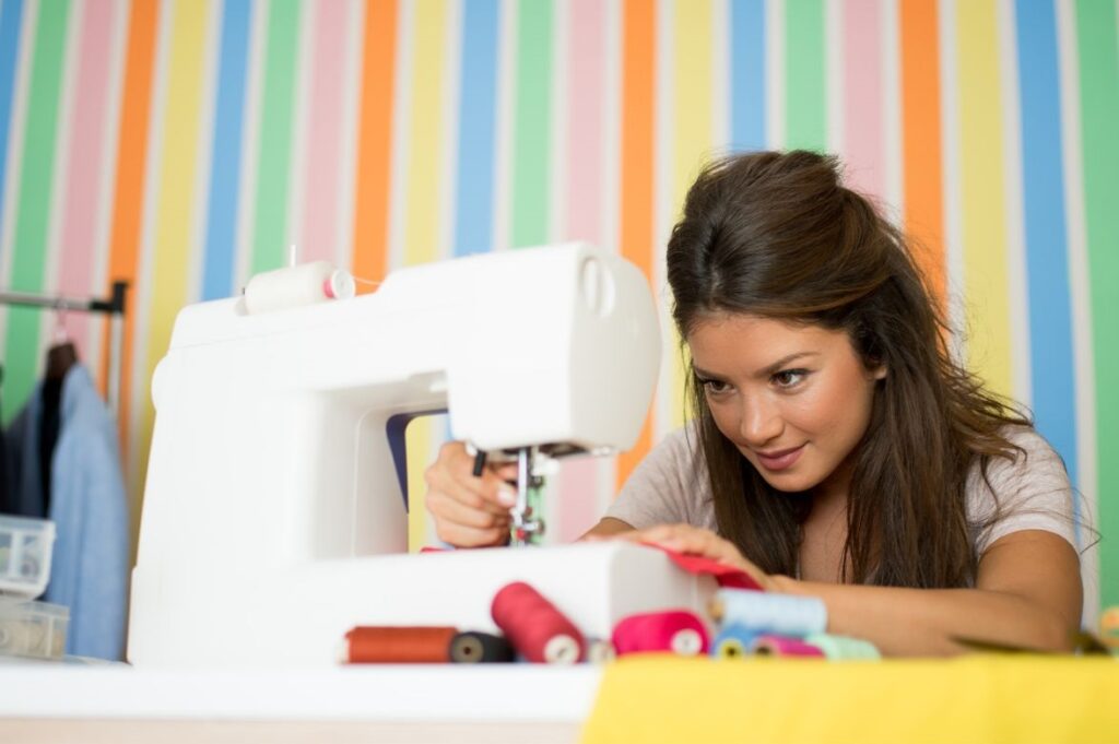 Woman Hunching at a Sewing Machine