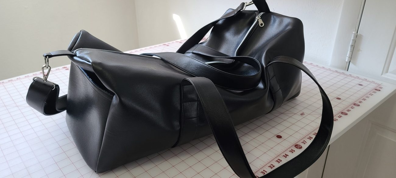 Finished Wanderlust Duffel Bags with University of Utah and BYU fabric linings