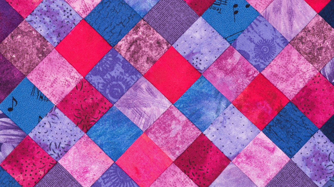 Wool pressing mat under quilt block