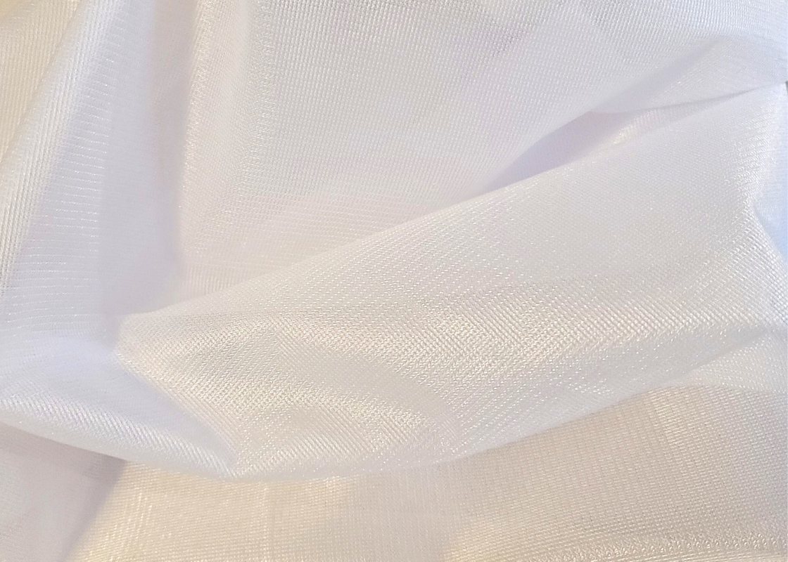 Sewist pressing fusible tricot interfacing onto fabric with iron