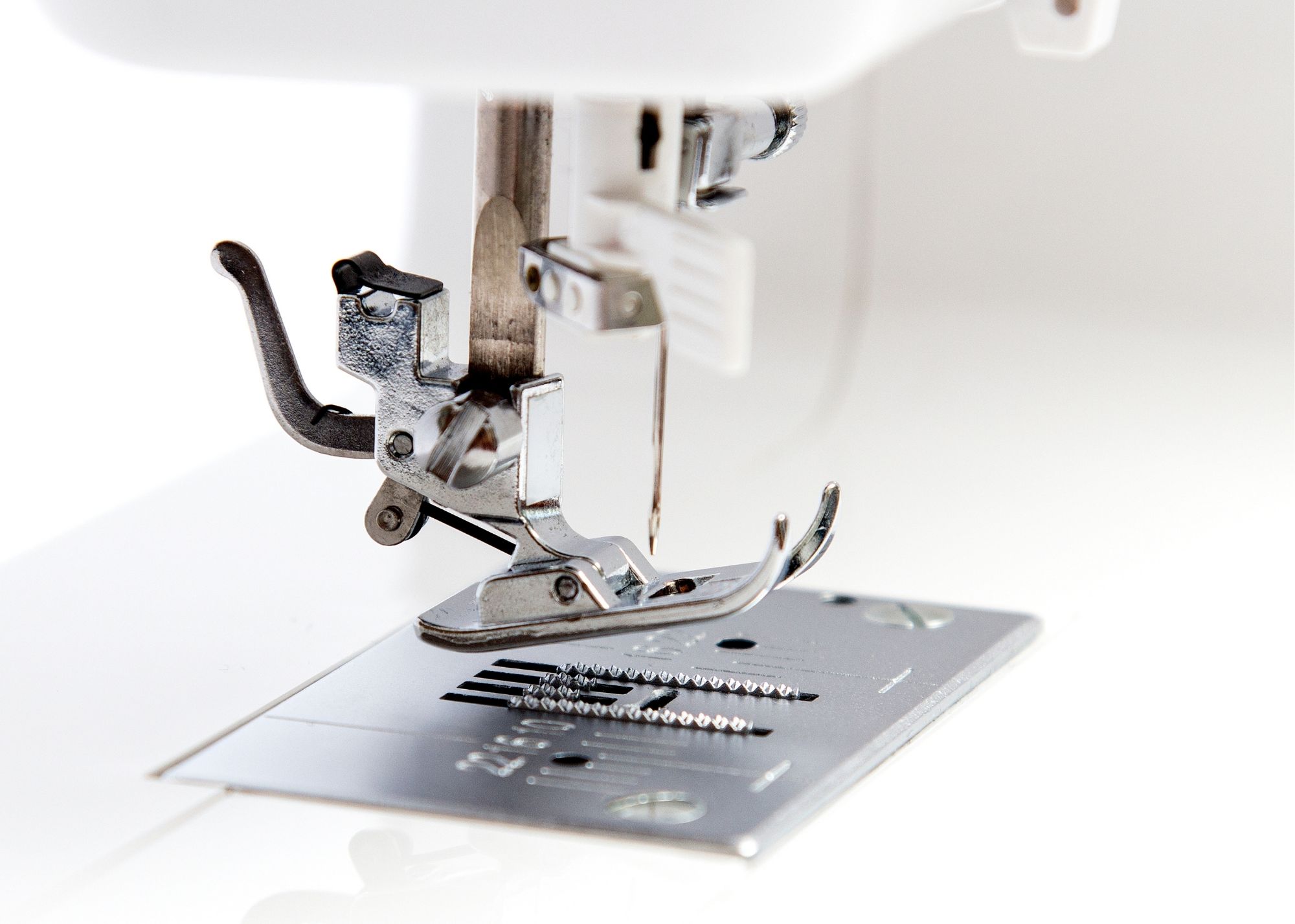 how a sewing machine works
