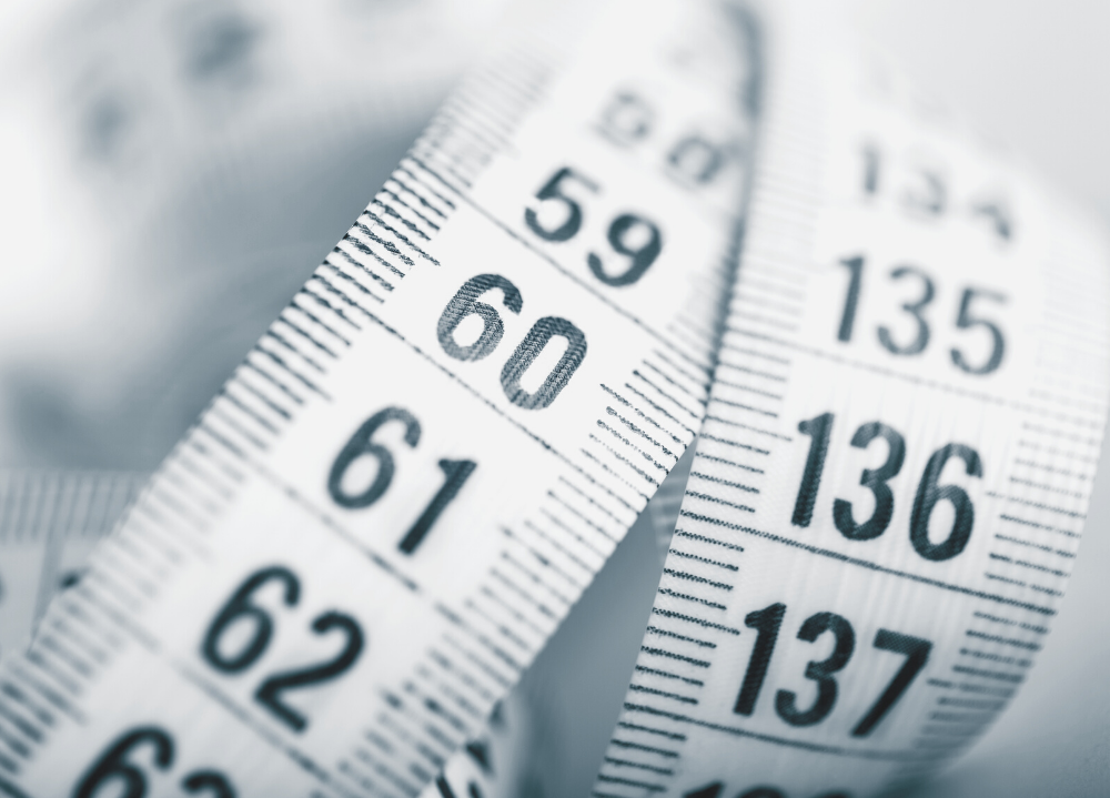 Measuring tape on torso to take accurate body measurements for sewing projects