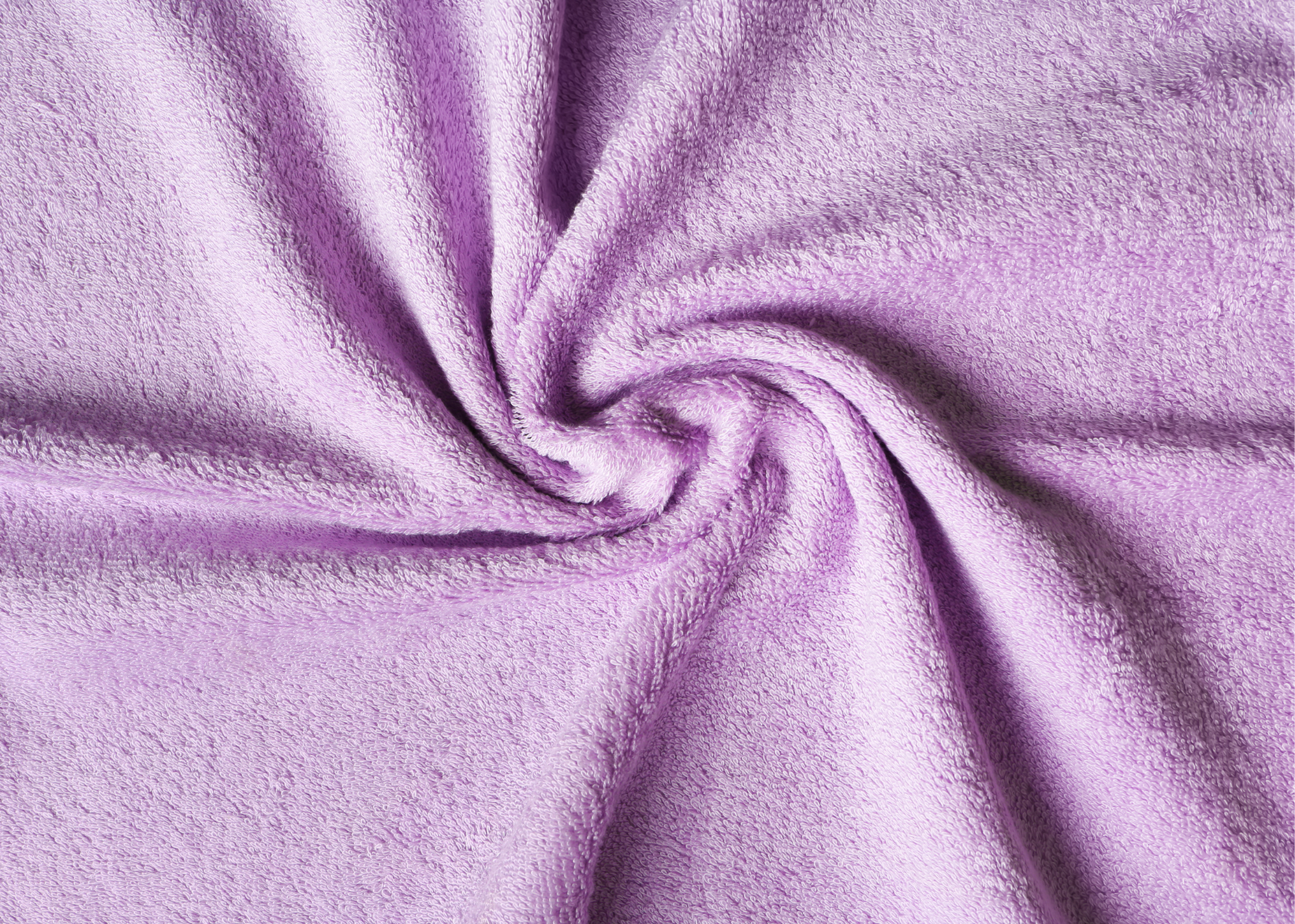 Hands sewing terrycloth fabric on a sewing machine with pins and thread